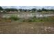 Scenic backyard featuring views of a pond, perfect for relaxing and enjoying nature at 273 Gulfport Ln, Spring Hill, FL 34608