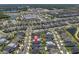 Stunning aerial view of a neighborhood close to shopping, lakes and green spaces at 2815 Dudley Ave, Odessa, FL 33556