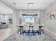 View of the dining room featuring access and view to the screened in patio and pool at 2815 Dudley Ave, Odessa, FL 33556