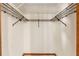 This walk-in closet offers storage with wire shelving and a light colored interior at 3029 Harrow Rd, Spring Hill, FL 34606