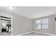 Cozy bedroom with window, carpet, and dark furniture at 3057 Riders Pass, Odessa, FL 33556