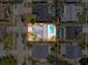 Aerial view of the property highlighting its location and surrounding neighborhood at 3074 Cara Ct, Palm Harbor, FL 34684