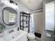 Updated bathroom featuring new fixtures, stylish mirror, and a walk-in shower at 3074 Cara Ct, Palm Harbor, FL 34684