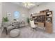 Bright home office with a comfortable chair, work space, and stylish decor for a productive and inviting atmosphere at 4044 Chesterfield Dr, Spring Hill, FL 34609