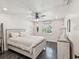 Comfortable bedroom features stylish decor, ceiling fan, and a serene ambiance at 4315 Oakland Dr, New Port Richey, FL 34653