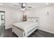 Comfortable bedroom features stylish decor, ceiling fan, and a serene ambiance at 4315 Oakland Dr, New Port Richey, FL 34653