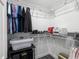 Well-organized walk-in closet with shelving for clothes and storage at 4315 Oakland Dr, New Port Richey, FL 34653
