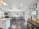 Open-concept living area with modern decor, including hardwood floors and decorative wall art at 4315 Oakland Dr, New Port Richey, FL 34653