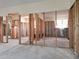 Unfinished living room showcasing an open layout with natural light from bright windows at 4328 Marine Pkwy, New Port Richey, FL 34652