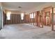 Unfinished living room with windows and open layout, ready for customization at 4328 Marine Pkwy, New Port Richey, FL 34652