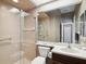 Bathroom with a walk-in shower, neutral color scheme, and storage at 4423 Gevalia Dr, Brooksville, FL 34604