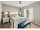 Bright bedroom features a large bed, and a window with natural light at 4423 Gevalia Dr, Brooksville, FL 34604