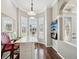 Bright breakfast nook with bay windows and unique seating area, offering a cozy spot for casual dining at 4423 Gevalia Dr, Brooksville, FL 34604