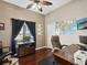 Inviting home office with hardwood floors and a large window with natural light at 4423 Gevalia Dr, Brooksville, FL 34604