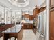 Gourmet kitchen with granite countertops, stainless steel appliances, and custom cabinetry at 4423 Gevalia Dr, Brooksville, FL 34604