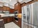 Well-appointed kitchen featuring stainless steel appliances, custom cabinetry, and ample counter space at 4423 Gevalia Dr, Brooksville, FL 34604