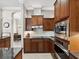 Close up of kitchen appliances and countertops with view to breakfast nook at 4423 Gevalia Dr, Brooksville, FL 34604