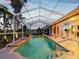 Covered pool area featuring a clean design and a beautiful outdoor living space at 4423 Gevalia Dr, Brooksville, FL 34604