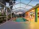 Beautiful screened-in pool with a spacious patio, perfect for outdoor relaxation and entertainment at 4423 Gevalia Dr, Brooksville, FL 34604