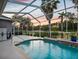 Enjoy the sunset view over the golf course from the screened-in pool and deck area at 4423 Gevalia Dr, Brooksville, FL 34604