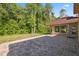 A spacious backyard with a brick patio at 4469 Lake In The Woods Dr, Spring Hill, FL 34607