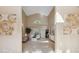 Bright open living space with high ceilings, neutral decor, tile floors, and a grand entrance at 4469 Lake In The Woods Dr, Spring Hill, FL 34607