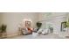 Bright living room with soaring ceilings, neutral paint, fireplace and ample sunlight at 4469 Lake In The Woods Dr, Spring Hill, FL 34607