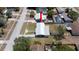 Overhead view of the neighborhood featuring a home with a long driveway in a residential area at 5031 Essex Ln, Spring Hill, FL 34606