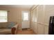 Inviting entryway with a decorative door, closet, and views of the living area at 5031 Essex Ln, Spring Hill, FL 34606