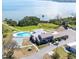 A waterfront property boasting a swimming pool with a beautiful water view at 585 Sky Harbor Dr # 219, Clearwater, FL 33759