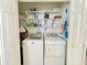 Laundry closet with included washer and dryer, and plenty of storage space at 585 Sky Harbor Dr # 219, Clearwater, FL 33759