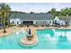 A well-equipped pool area with tables, sun loungers, and a covered bar, ideal for relaxation at 6063 Dusk Rose Ln, Brooksville, FL 34601