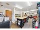 A spacious garage is set up with a workbench, storage, and additional cabinetry with sink at 6080 Dexter Ln, Brooksville, FL 34602