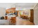Eat-in kitchen with modern appliances, a peninsula island, and a cozy dining area at 6080 Dexter Ln, Brooksville, FL 34602