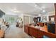 Spacious office with built-in desk and storage and sliding door to the exterior at 6080 Dexter Ln, Brooksville, FL 34602