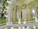 Aerial view of well maintained homes, green lawns and landscaping in a suburban neighborhood at 6561 Seaway Dr, Brooksville, FL 34604