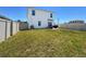 Good size backyard area featuring a white privacy fence and patio at 6561 Seaway Dr, Brooksville, FL 34604