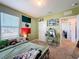 Cozy bedroom with carpet, décor and window at 6561 Seaway Dr, Brooksville, FL 34604