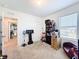 Spacious carpeted bedroom with natural light and decorative accents at 6561 Seaway Dr, Brooksville, FL 34604