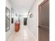 Hallway with tile floor leading to the front door at 6561 Seaway Dr, Brooksville, FL 34604