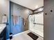 Elegant main bathroom with dual sinks, sleek fixtures, and glass enclosed shower at 6561 Seaway Dr, Brooksville, FL 34604