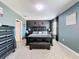 Comfortable main bedroom with a spacious layout, soothing colors, and neutral carpet at 6561 Seaway Dr, Brooksville, FL 34604