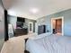 Comfortable main bedroom with a spacious layout, soothing colors, and neutral carpet at 6561 Seaway Dr, Brooksville, FL 34604
