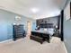 Comfortable main bedroom with a spacious layout, soothing colors, and neutral carpet at 6561 Seaway Dr, Brooksville, FL 34604