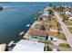 Waterfront homes aerial, showcasing easy canal access, and a serene residential setting near the open water at 6622 Seaview Blvd, Hudson, FL 34667
