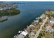 Stunning aerial view of waterfront homes along a tranquil canal, showcasing the community's prime location at 6622 Seaview Blvd, Hudson, FL 34667