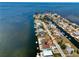 Aerial view of waterfront homes along a narrow canal in a coastal community at 6622 Seaview Blvd, Hudson, FL 34667