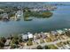 Scenic aerial view of waterfront community, highlighting its canal-front properties and access to open water at 6622 Seaview Blvd, Hudson, FL 34667