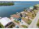 Aerial view of waterfront homes with private docks and boat access, offering a picturesque coastal lifestyle at 6622 Seaview Blvd, Hudson, FL 34667