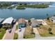 Aerial view of waterfront homes along the canal, showing convenient boat access and desirable neighborhood layout at 6622 Seaview Blvd, Hudson, FL 34667